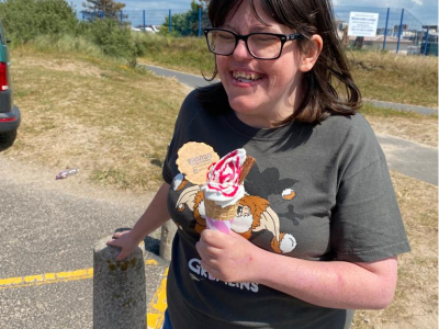 Poplars resident holding an ice cream